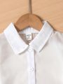 SHEIN Kids EVRYDAY Little Girls' Button-Up Collar Shirt And Textured Strap Shorts Set