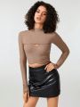 Manon Gautier Mock Neck Cut Out Front Crop Top