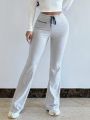 SHEIN SXY Drawstring Waist Flared Pants