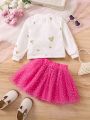 SHEIN Kids KDOMO Young Girl Character & Letter Printed Top With Heart Mesh Tutu Skirt Two Piece Set