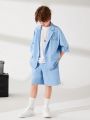 SHEIN Kids EVRYDAY Tween Boys' Casual Korean Style Loose Fit Short Sleeve Blazer Jacket With Turn-Down Collar And Plain Weave Shorts Two Piece Set
