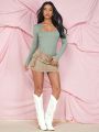 SHEIN BAE Solid Color Hollow Out Long Sleeve Bodysuit