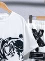 SHEIN Kids EVRYDAY Boys' Street Style Casual Cartoon Printed Short Sleeve T-Shirt And Knitted Shorts Outfit, Summer