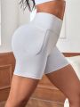 SHEIN Yoga Basic Solid Color High Waist Yoga Shorts With Peach Buttock Effect, Tight Elastic Fitness Workout Hot Pants For Women