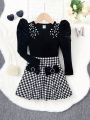 SHEIN Kids FANZEY Little Girls' Short Plush Round Neck Sheep Leg Sleeve Top & Knitted Houndstooth Loose Half-skirt Two-piece Set