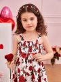 SHEIN Kids CHARMNG Young Girls' Flower Patterned Cami Dress With Bowknot Decoration