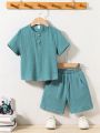 SHEIN Kids EVRYDAY Young Boys' Loose Casual Solid Color Short Sleeve T-Shirt And Shorts 2pcs Set