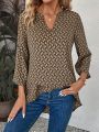 Printed Shirt With Notched Collar, Rolled Up Sleeves, High-Low Hem, And Cross Front Detail