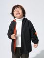 JNSQ Young Boy Letter Graphic Contrast Tape Flap Pocket Hooded Thermal Coat