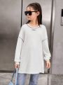 SHEIN Kids Nujoom Tween Girls' Loose Retro Contrast Stitching Woven And Decorative Round Neck Long-Sleeved T-Shirt