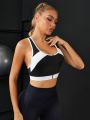 Two Tone Zip Up Crisscross Back Sports Bra