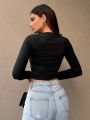 SHEIN Essnce Women's Fishnet Patchwork Round Neck Long Sleeve Asymmetrical Black T-Shirt