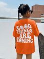 SHEIN Kids Cooltwn Tween Girls' Loose Fit Sporty Casual Short Sleeve T-Shirt With Emoji & Slogan Print