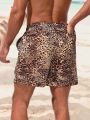 SHEIN Men's Leopard Print Beach Shorts With Slanted Pockets