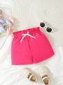 SHEIN Kids EVRYDAY Girls' Rose Red Bow Shorts