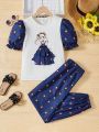 SHEIN Kids Nujoom Tween Girls' Loose Fit Floral Printed Splicing T-Shirt And Pants Set With Cartoon Girl Pattern