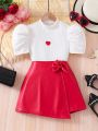 SHEIN Kids FANZEY 2pcs/Set Teen Girls' Heart Applique T-Shirt With Bow Decorated Skirt