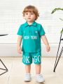 SHEIN Baby Boy Casual Outdoor Letter Pattern Short Sleeve Polo Shirt And Shorts Set