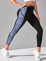 Camo Print Contrast Letter Tape Sports Leggings With Phone Pocket