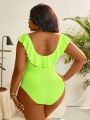 SHEIN Swim Basics Plus Size Solid Color Swimsuit With Ruffled Hem, Hollow Out Cross Design, Monokini