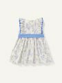 Cozy Cub Baby Girl Floral Pattern Color-Contrast Ruffle Hem Round Neck Sleeveless Bowed Waist Dress