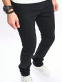 Men's Loose Fit Straight Leg Jeans With Slant Pockets