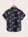 SHEIN Kids SUNSHNE Toddler Boys Tropical Print Button Front Shirt