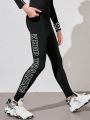 Teenage Boys' Outdoor Sports Yoga Pants, Black & White Letter Print, High Elasticity, Suitable For Running, Cycling, Hiking, Indoor Training, Etc.