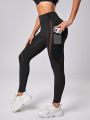 SHEIN Mesh Insert Phone Pocket Side Sports Leggings