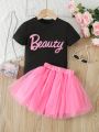 SHEIN Kids FANZEY Toddler Girls' Letter Printed Short Sleeve T-Shirt And Tutu Net Yarn Half Skirt Set