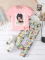 SHEIN Kids HYPEME Girls' Street Style Bowknot Printed Short Sleeve T-Shirt And Graffiti Cartoon All-Over Printed Pants Two-Piece Set For Summer