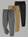 Manfinity Men's Woven Casual Jogger Pants With Elastic Hem