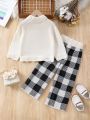 SHEIN Kids EVRYDAY Toddler Girls' Simple Batwing Sleeve Sweater And Plaid Knitted Pants Set