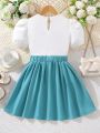 SHEIN Kids FANZEY Girls Contrast Binding Puff Sleeve Blouse & Pleated Skirt