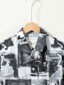 SHEIN Kids Cooltwn Tween Boys' Casual Cool Street-Style Surfing Print Camp Collar Loose-Woven Short Sleeve Shirt