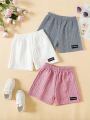 SHEIN Kids CHARMNG Toddler Girls' Casual Cute White Letter & Colorful Knit Texture Shorts 3pcs/set