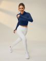 SHEIN Leisure Solid Crop Sports Hoodie With Thumb Holes