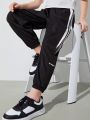 SHEIN Kids EVRYDAY Boys' Loose Fit Casual Color Block Spliced Elastic Hem Jogger Pants