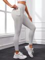 SHEIN Yoga Basic Solid Color High-Waist Sports Leggings With Phone Pocket (Plus Size)