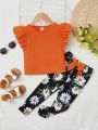 SHEIN Kids EVRYDAY Young Girls' Comfortable Casual Flying Sleeve Top & Flower Printed Pants Two-Piece Set