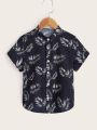 SHEIN Kids SUNSHNE Toddler Boys Tropical Print Button Front Shirt