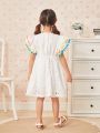 SHEIN Kids FANZEY Young Girl's Romantic Casual Elegant Comfortable Embroidered Burnout Round Neck Dress With Ball Shaped Hem For Summer Vacation