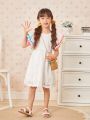 SHEIN Kids FANZEY Young Girl's Romantic Casual Elegant Comfortable Embroidered Burnout Round Neck Dress With Ball Shaped Hem For Summer Vacation