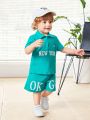 SHEIN Baby Boy Casual Outdoor Letter Pattern Short Sleeve Polo Shirt And Shorts Set