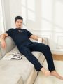 Men's Printed Short Sleeve T-Shirt With Round Neck And Solid Color Long Pants Homewear Set