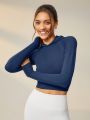 SHEIN Leisure Solid Crop Sports Hoodie With Thumb Holes