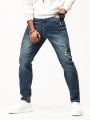 Men Ripped Frayed Bleach Wash Jeans