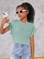 SHEIN Kids EVRYDAY Tween Girls' Knit Round Neck Solid Color Cropped Casual Short Sleeve T-Shirt