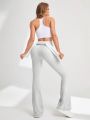 SHEIN Daily&Casual Solid Color Flared Sports Pants With Wide Waistband