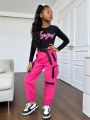 SHEIN Kids Cooltwn Tween Girl Letter Graphic Tee & Flap Pocket Buckle Belted Cargo Pants